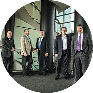 5 healthcare executives from mercy health standing in a stairwell.